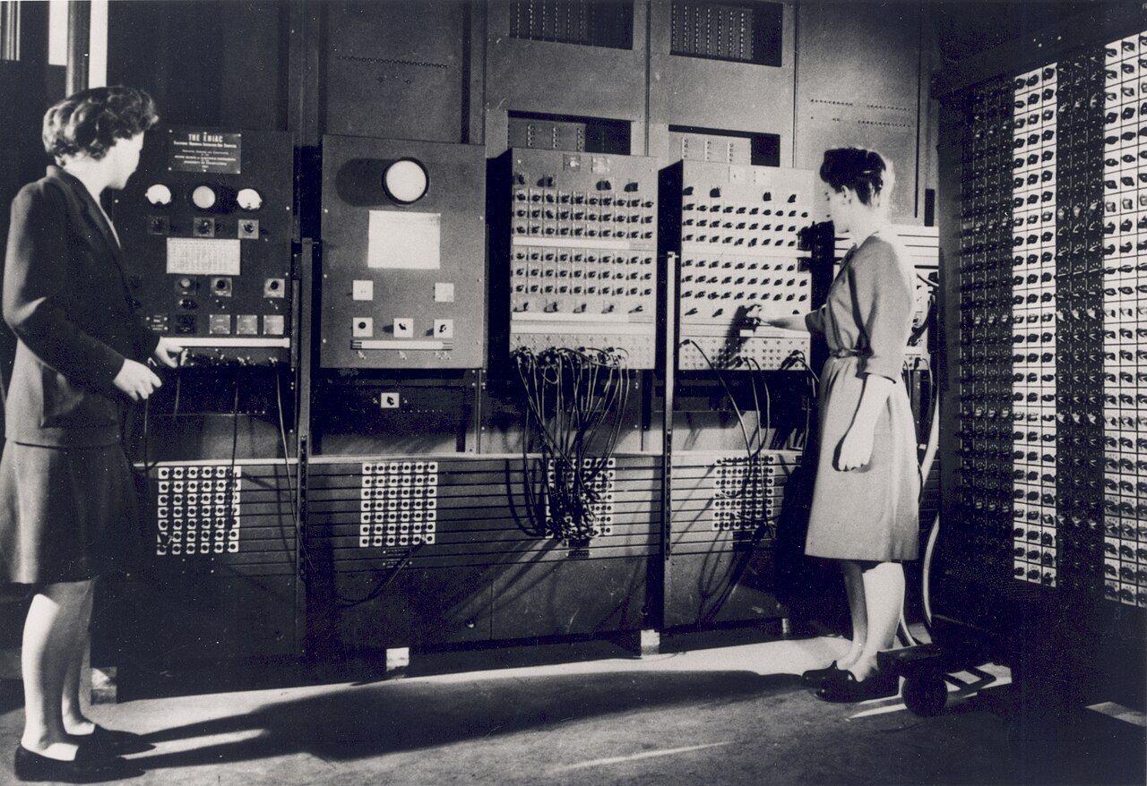 Two of the ENIAC programmers prepare the computer for Demonstration Day